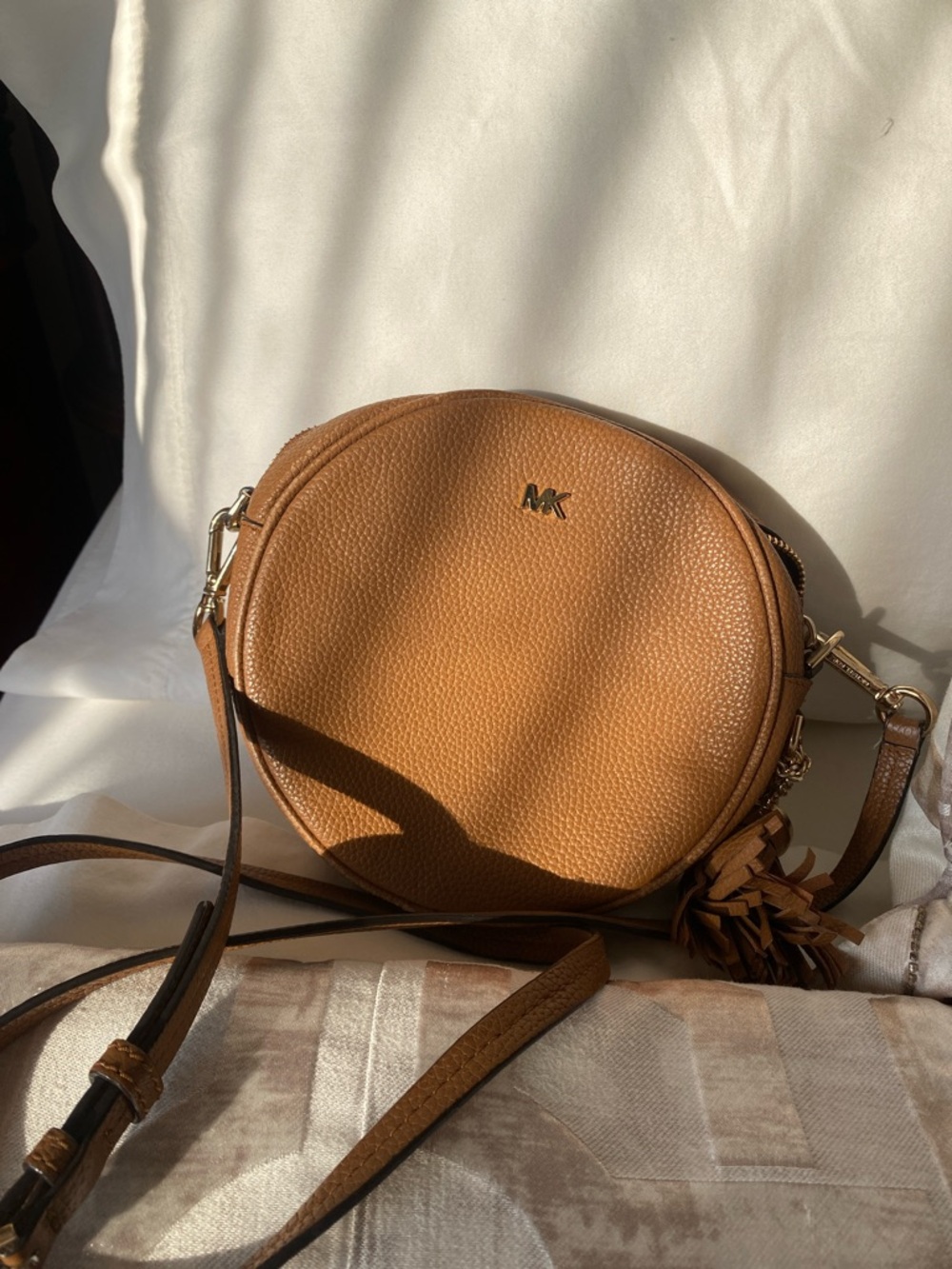 Michael Kors Cognac Pebbled Leather Round Crossbody with Tassel